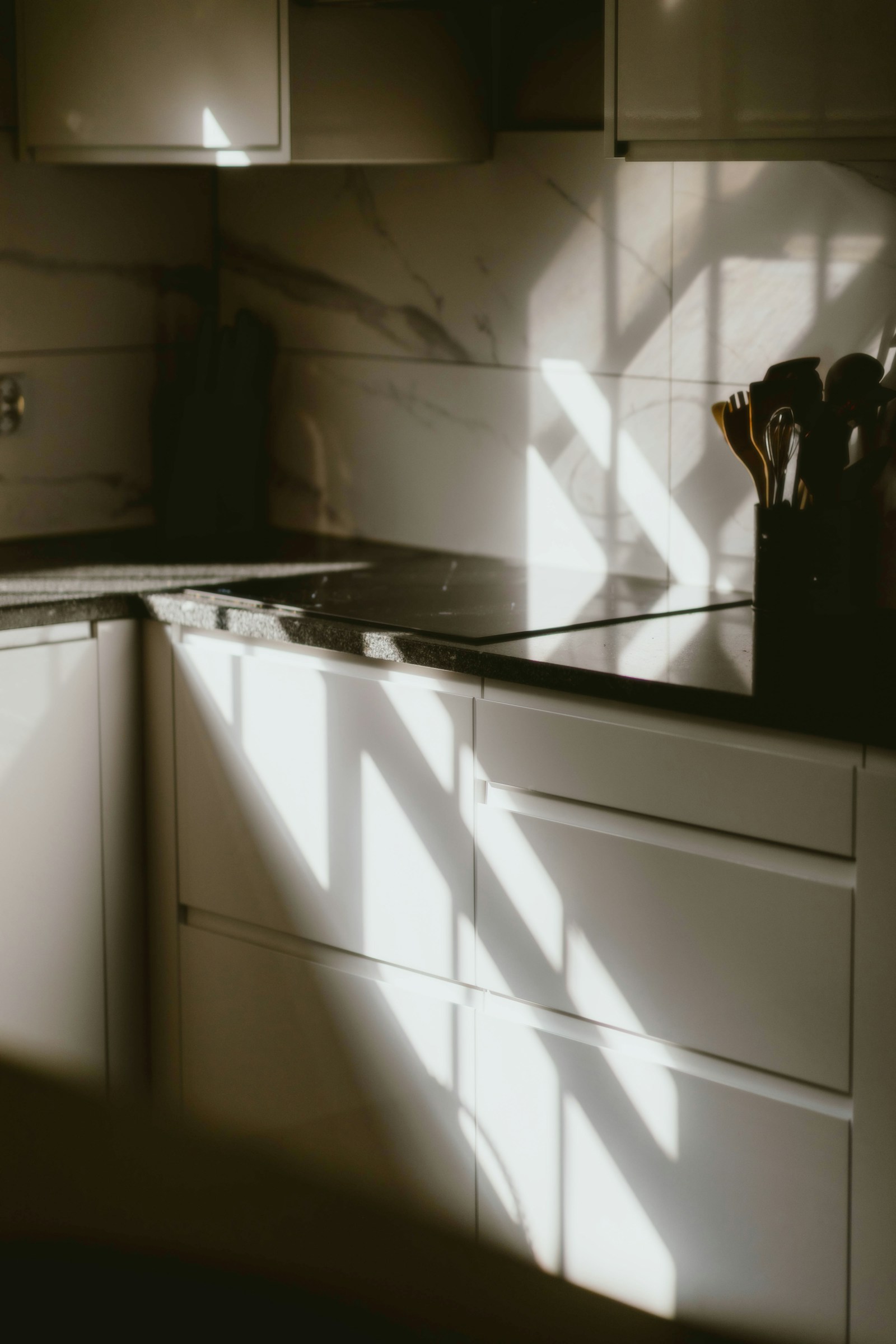 Sunlit modern apartment kitchen prepared for cleaning